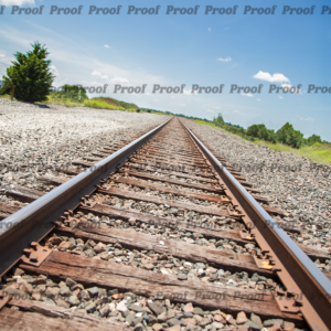 Railroad track stretching into the distance under a blue sky, used as Anatomy of Release chapter art