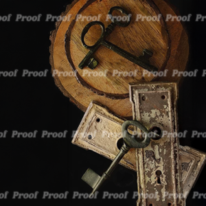 Antique keys and old lock plates arranged on a dark background, used as Anatomy of Release chapter art.